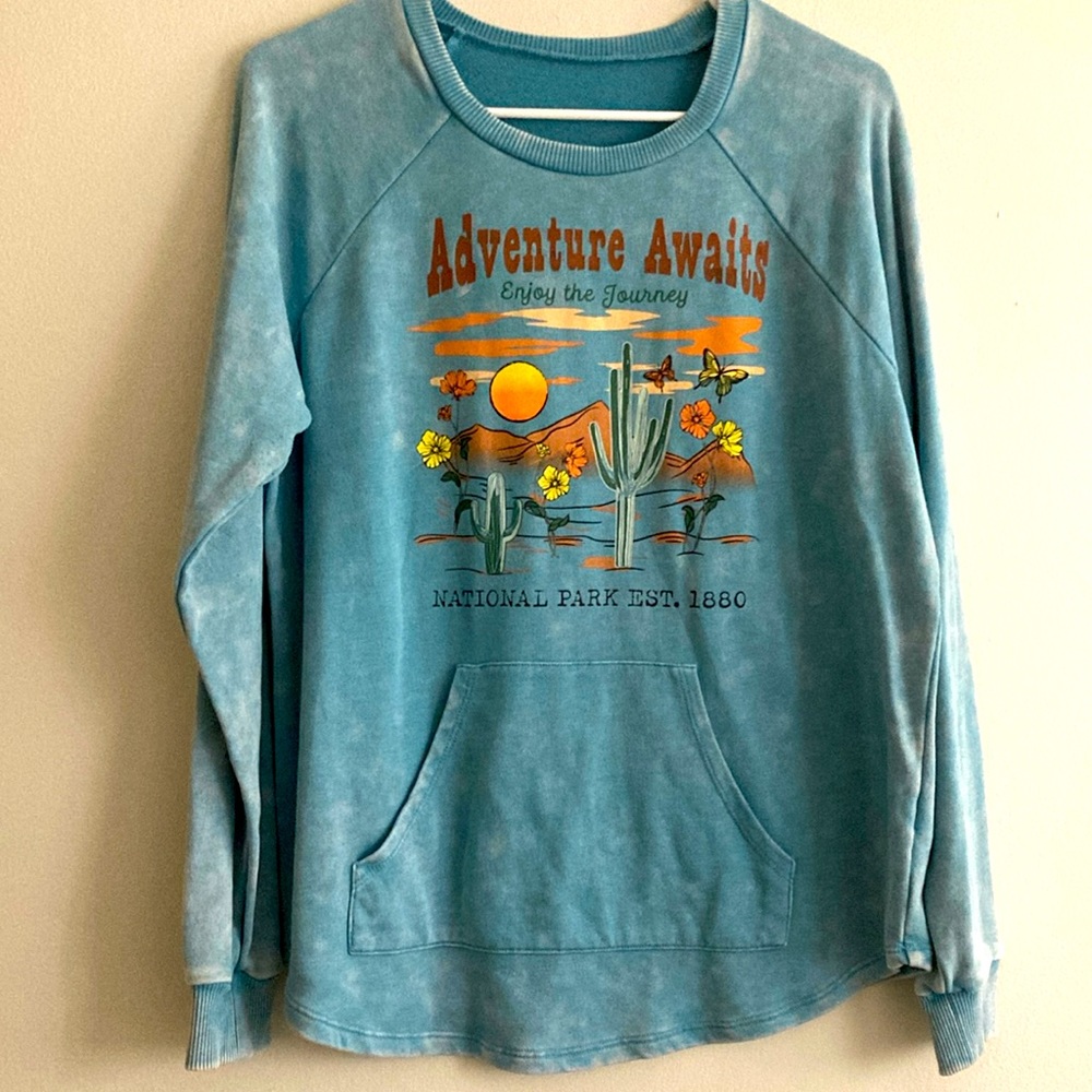 Super cute and soft western style sweater with pocket. Nearly new condition.